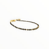 Bracelet "Eveil" Obsidienne dorée facettée