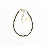 Bracelet "Eveil" Obsidienne dorée facettée