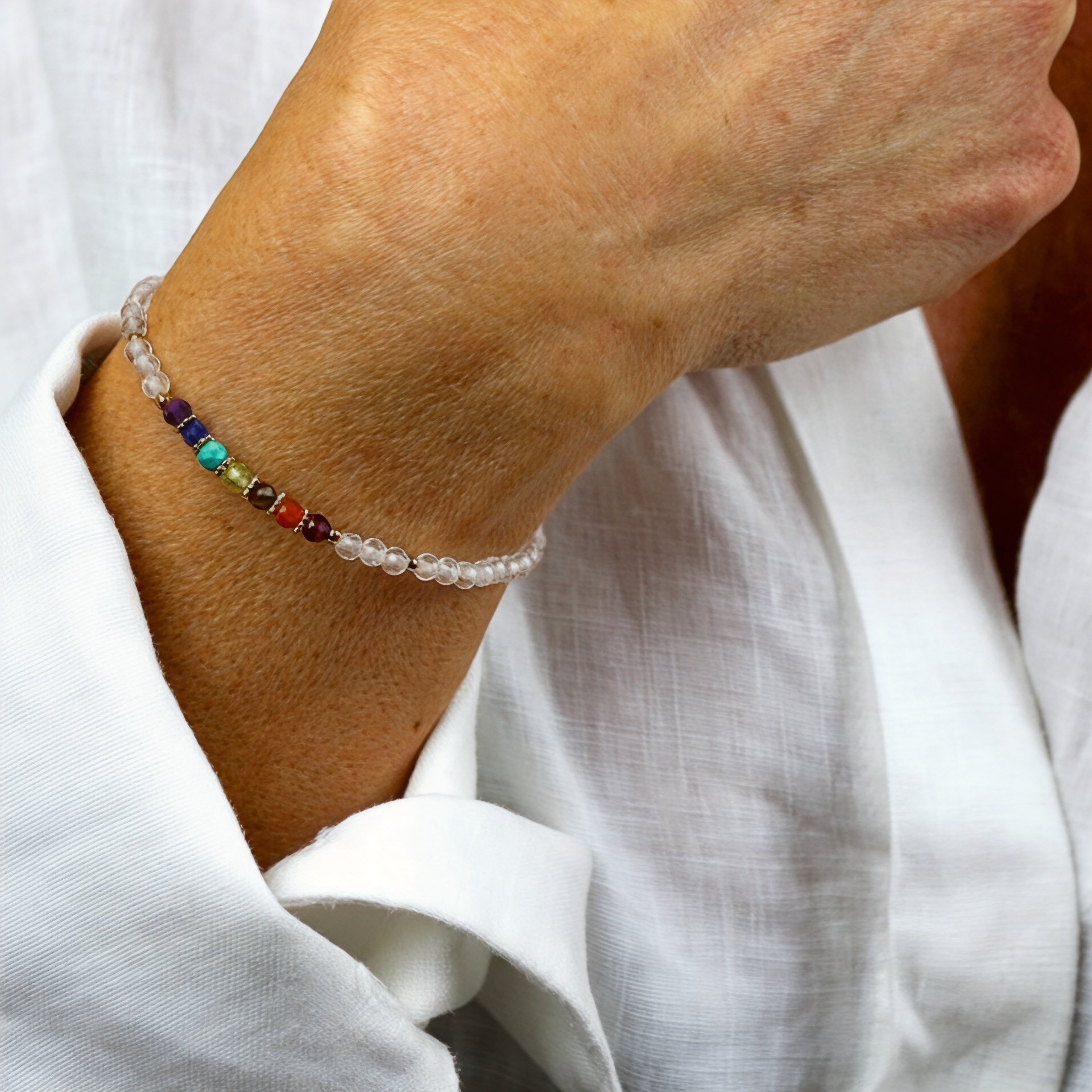 Bracelet "Eveil 7 Chakras" Cristal de Roche facetté